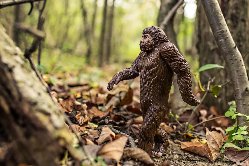 A toy model of Bigfoot walking through the forest